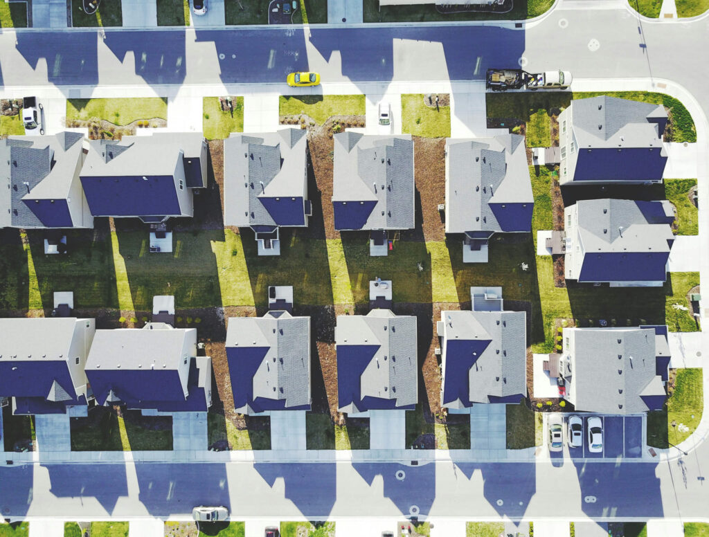 Birds eye view of modern houses on a street block